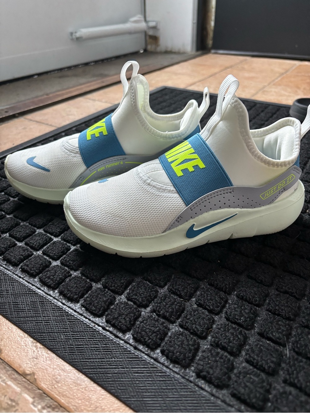 Nike Kids Slip-On Sneakers in White, Blue and Neon Yellow